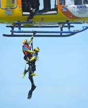A Person Is Winched Up And Aboard The RACQ CHRS Helicopter During The Mock Rescue-gallery