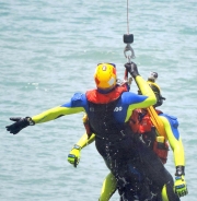 A Rescuer And Victim Are Winched From Keppel Bay During The RACQ CHRS Mock Rescue-gallery